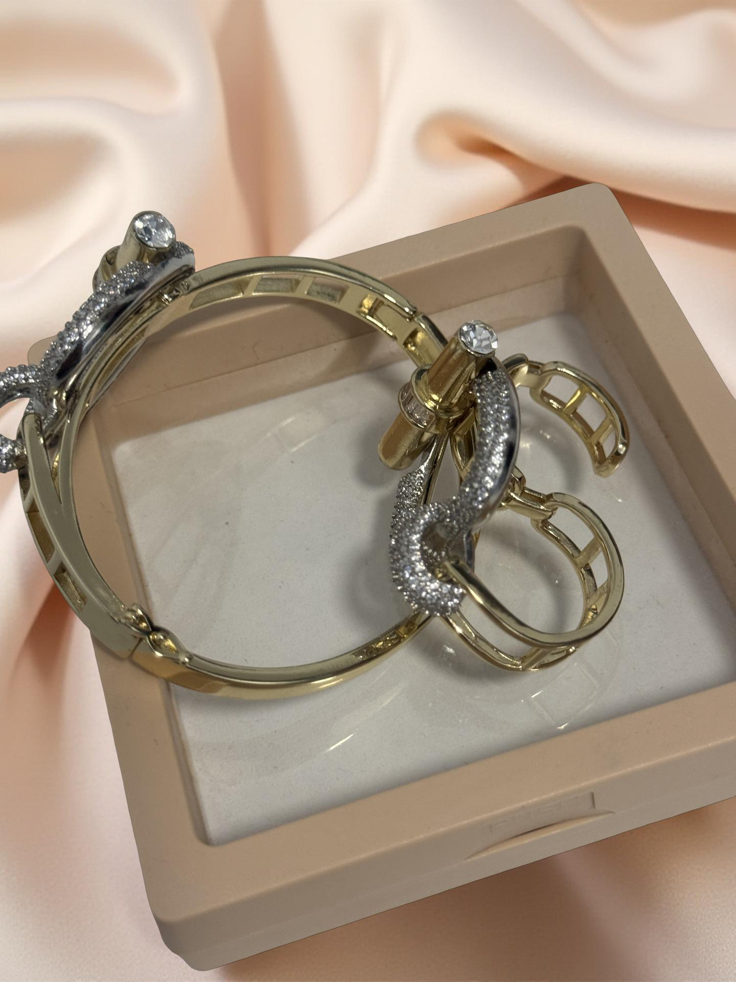 Elegant Gold & Crystal Knot Bangle Bracelet